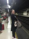 Lauren waiting: using the train around Barcelona